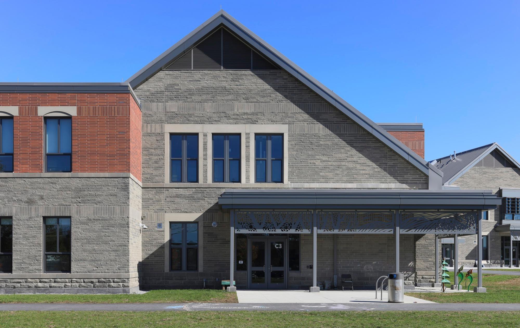 The red and gray brick exterior of Hildreth Elementary School